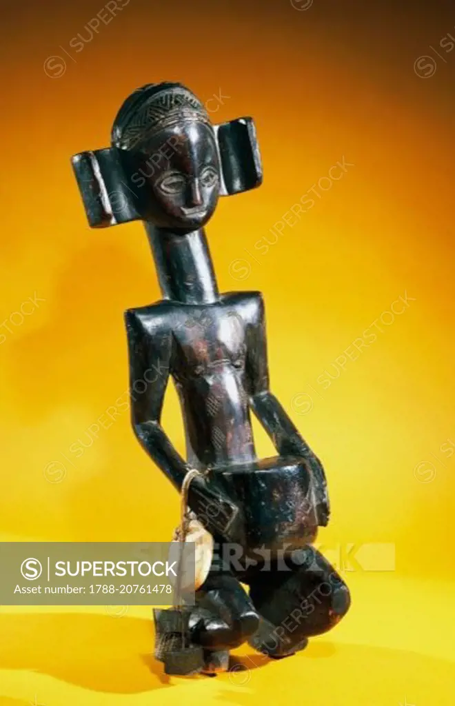 Wooden Luba statue of a female figure, Zambia.