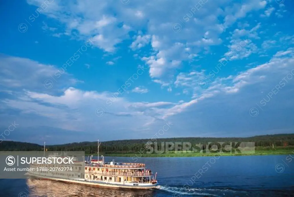 Cruise ship on the Yenisei river, Shushensky Bor National Park, Siberia, Russia.