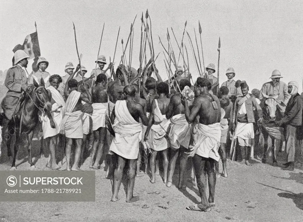 The Sultan of Gheledi's warriors standing before Major Antonino di Giorgio (1867-1932) in Benadir, Somalia, photograph by Italo Gentilucci, from L'Illustrazione Italiana, Year XXXV, No 48, November 29, 1908.