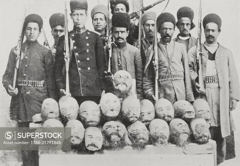 Government soldiers displaying the heads of some Arshad al- Dowleh's Turkmen, Persian constitutional revolution, Iran, photograph by G C Montagna, from L'Illustrazione Italiana, Year XXXVIII, No 40, October 1, 1911.