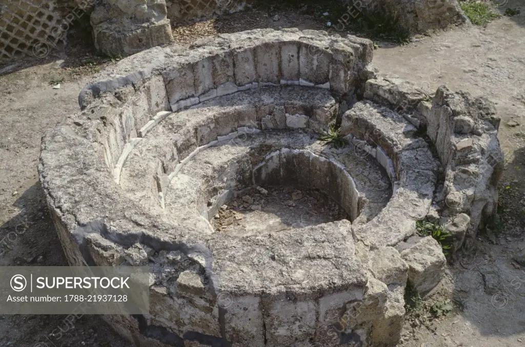 Baptismal font in the Greek-Roman Temple of Jupiter, turned into a Christian basilica between the 5th and 6th century, Cuma, Campania, Italy.