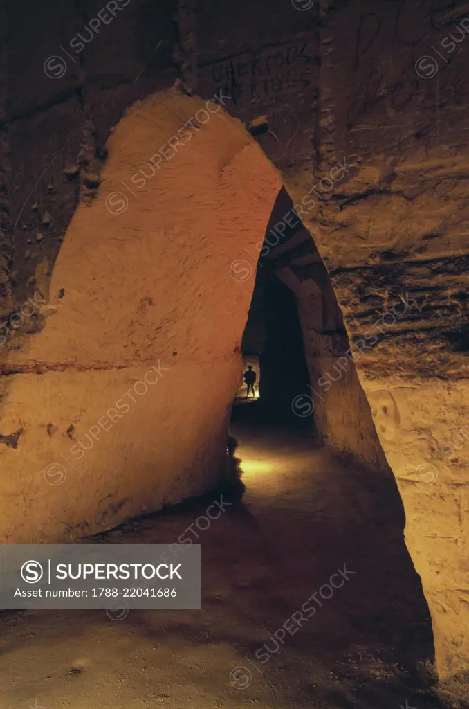 A rock-cut passage, among the underground tunnels of the Sint Pieter caves, Maastricht, Netherlands.