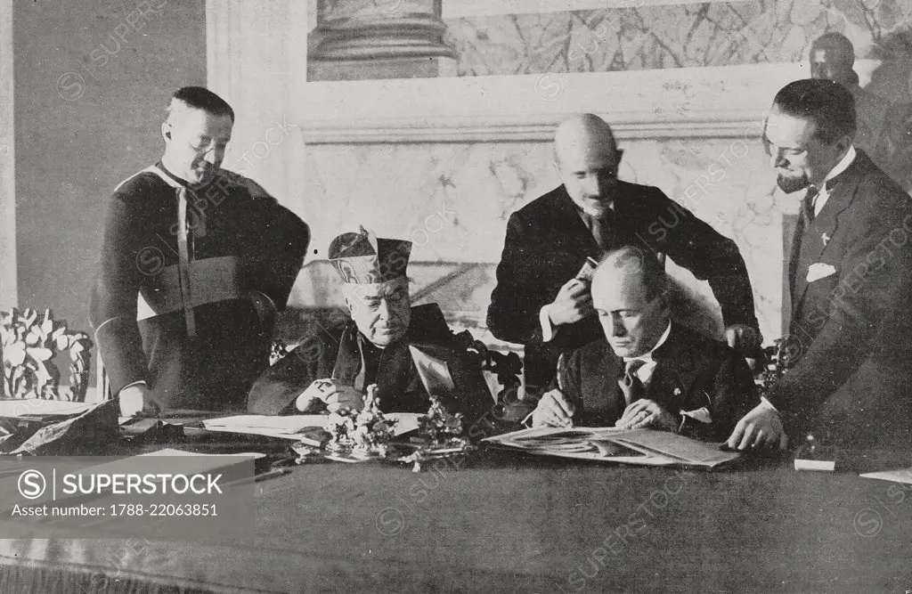 Benito Mussolini signing the Lateran pacts, February 11, 1929, from L'Illustrazione Italiana, Year LVI, No 7, February 17, 1929. - SuperStock