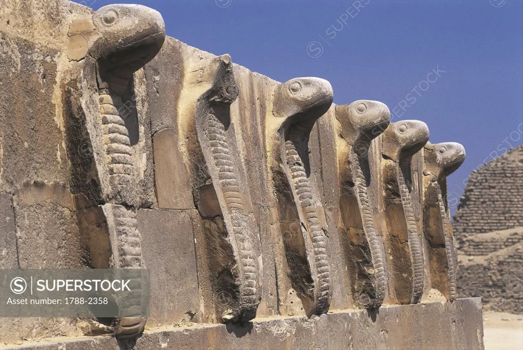 Egypt - Cairo - Ancient Memphis (UNESCO World Heritage List, 1979). Saqqara. Funerary monument to king Djoser 'Step Pyramid' complex. Cobra Wall