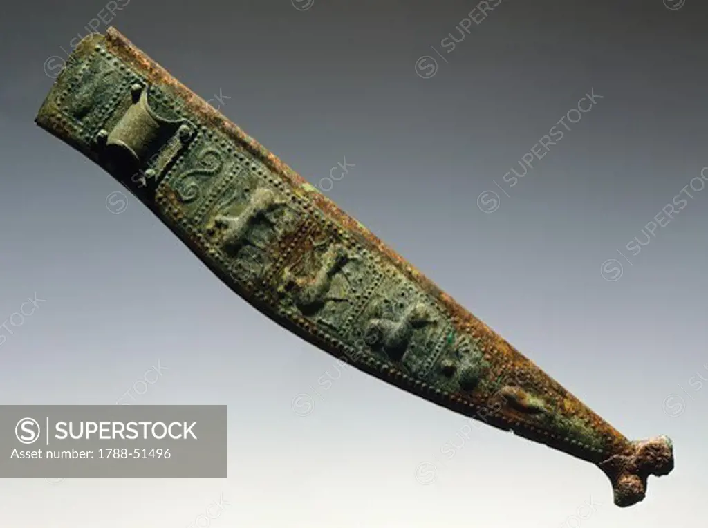 Bronze dagger sheath with embossed decorations and animal figures, Italy. Paleoveneti Civilization.