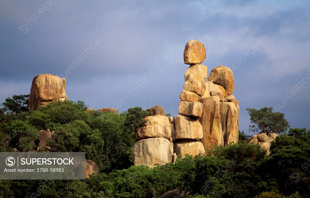 Mother and child, balancing rock formation from weathered granite, Matobo National Park (UNESCO World Heritage List, 2003), Zimbabwe.