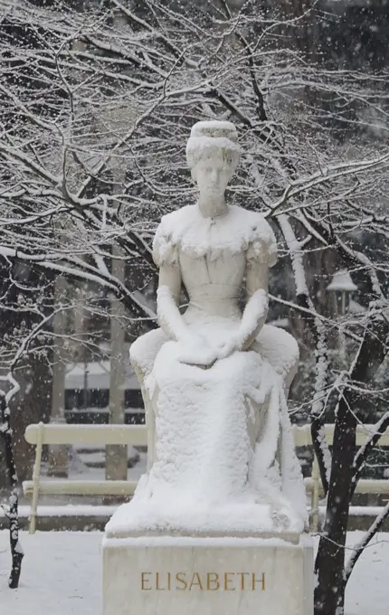 Snow falling on the Monument to Empress Sissi, 1903, by Hermann Klotz (1850-1932), marble, Winter Promenade, Merano, Trentino-Alto Adige, Italy, 20th century.