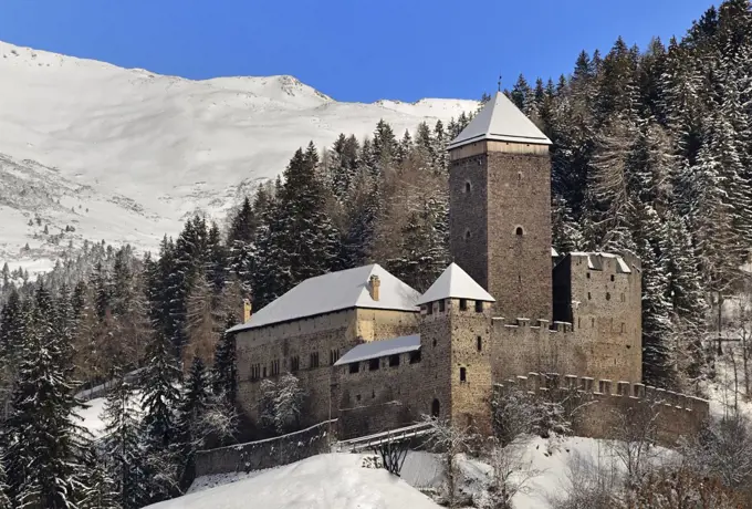 Regino Castle or Reinegg Castle, snowy landscape, Sarntal, Trentino-Alto Adige, Italy, 13th century.