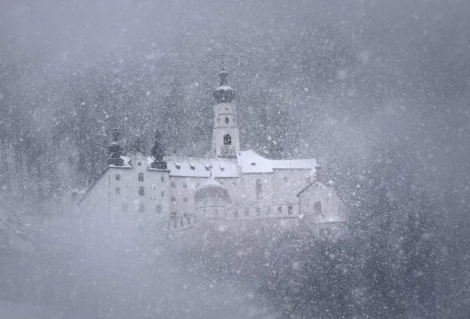 Marienberg Abbey under heavy snowfall, Burgeis, Vinschgau Valley, Trentino-Alto Adige, Italy, 12th century.