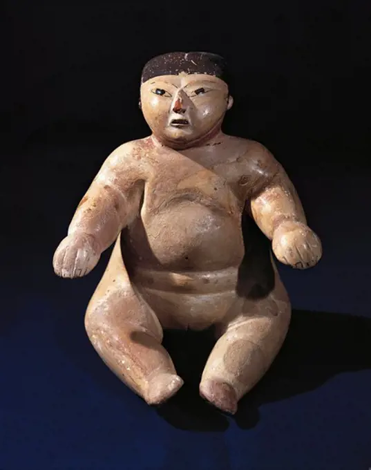 Female figure in polychrome ceramic, from Peru