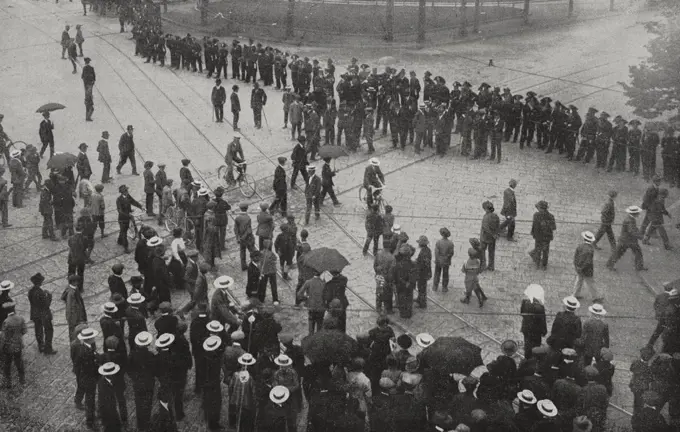 Soldiers blocking the streets at the demonstrators exit from the rally in the Arena, General strike in Milan, Italy, Red week, from L'Illustrazione Italiana, Year XLI, No 24, June 14, 1914.