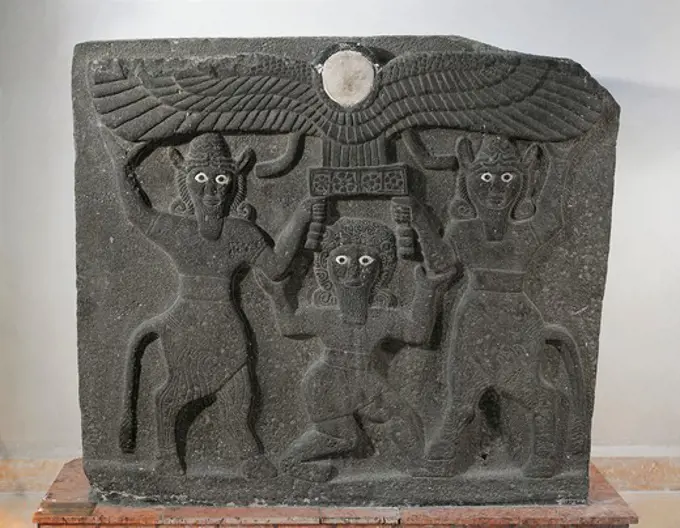 Orthostates depicting Gilgamesh between two minotaur demigods holding up the sun disc, artefacts from Tell Halaf, Syria. Assyrian civilisation, 9th Century BC.