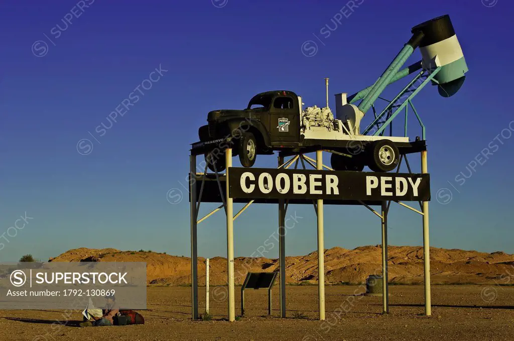 Australia, South Australia, Coober Pedy, a blower, a truck for opal mining symbol of the entrance of Coober Pedy