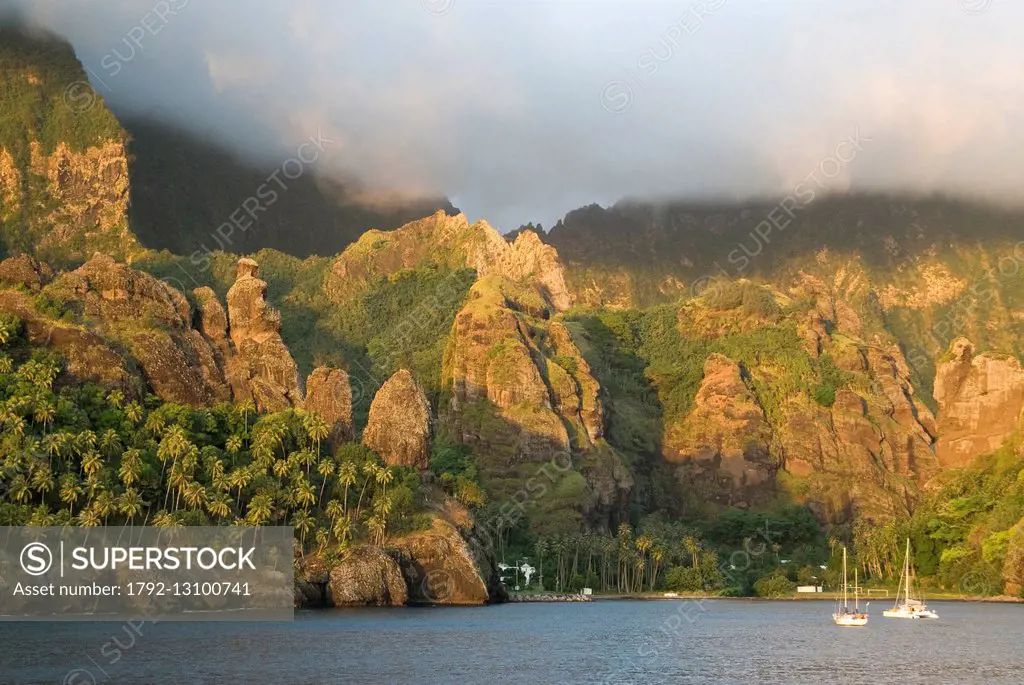 France, French Polynesia, Marquesas islands, Fatu Hiva island, Hanavave, sunset over the bay of Hanavave also called Bay of Virgins