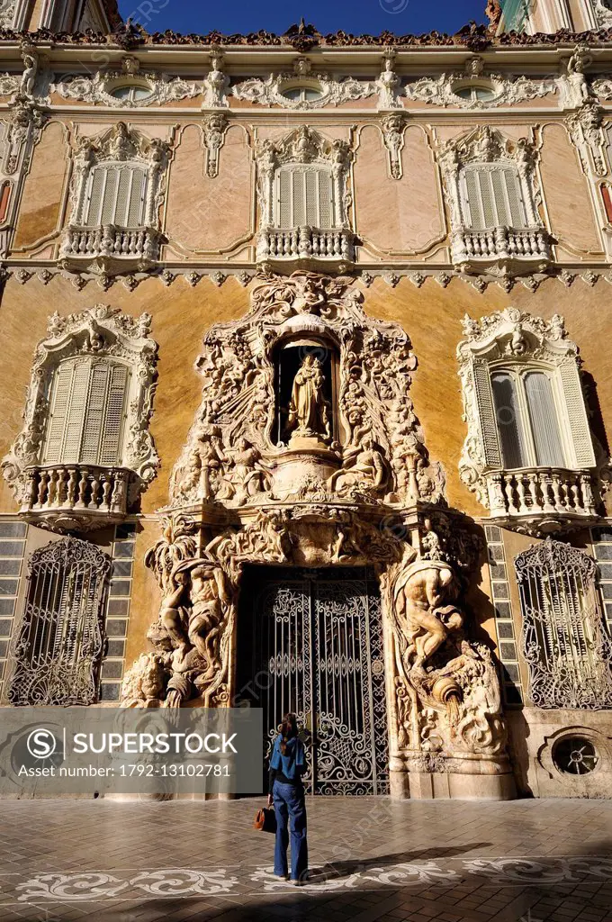 Spain, Valencia, façade of the Palacio Marques de dos Aguas XV century, houses the Ceramics Museum Gonzalez Marti, portal Baroque Valencian by Ignacio...