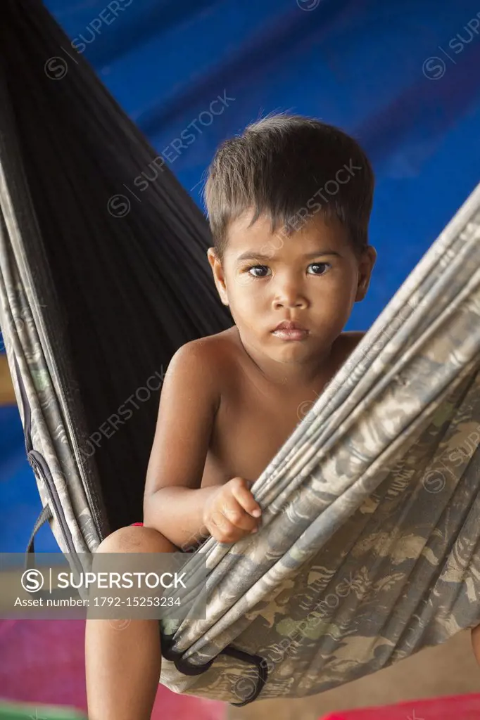 Philippines, Luzon, Albay Province, Tiwi, boy in a hammoc