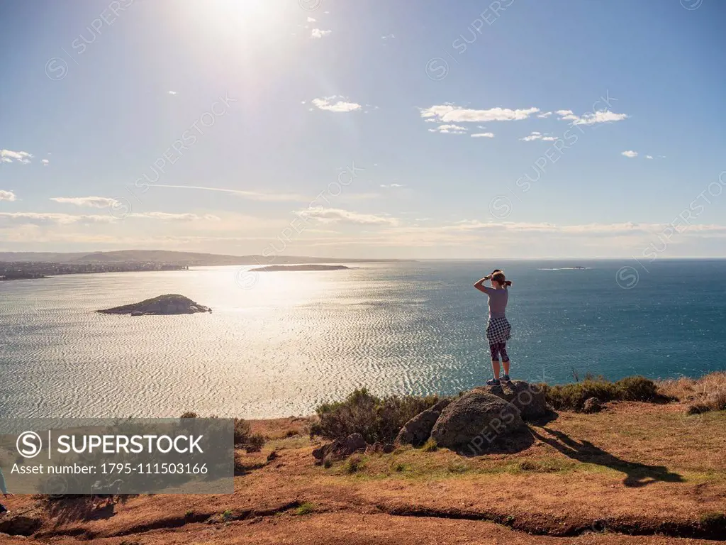 Woman looking at view of Victor Harbor, South Australia, Australia