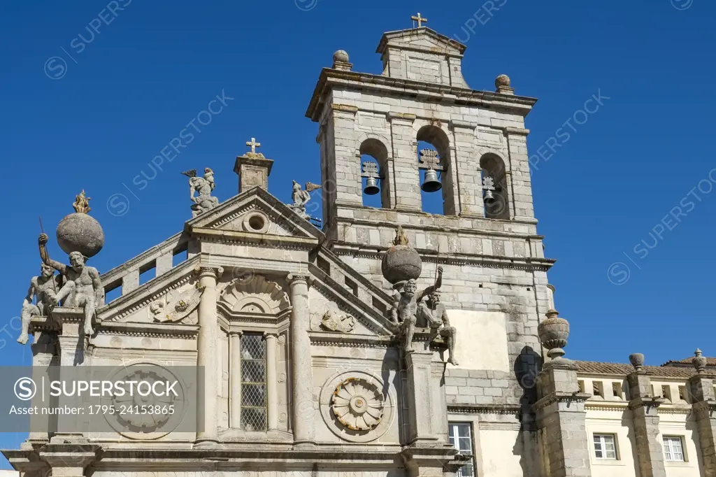 Portugal, Evora, Exterior of old church with bell tower
