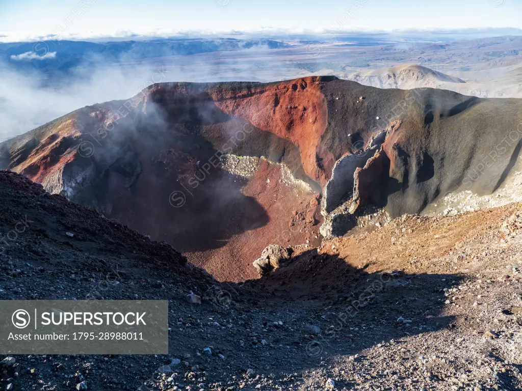 New Zealand, Waikato, Tongariro National Park, Steam raising over crater of Mount Ngauruhoe