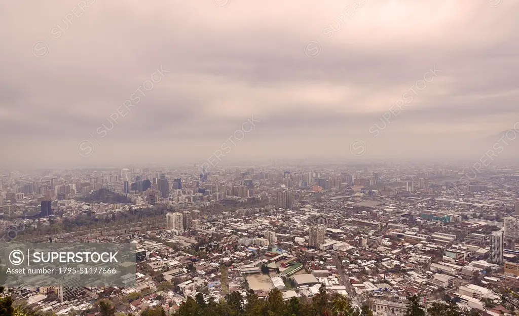 Chile, Santiago, Storm clouds over cityscape