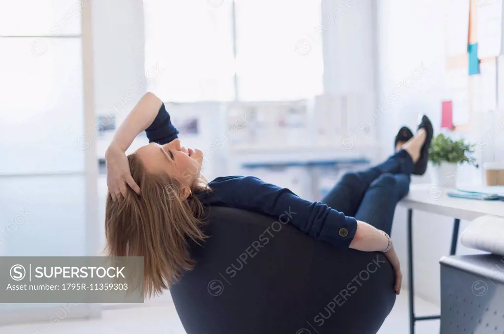 Business woman relaxing in office