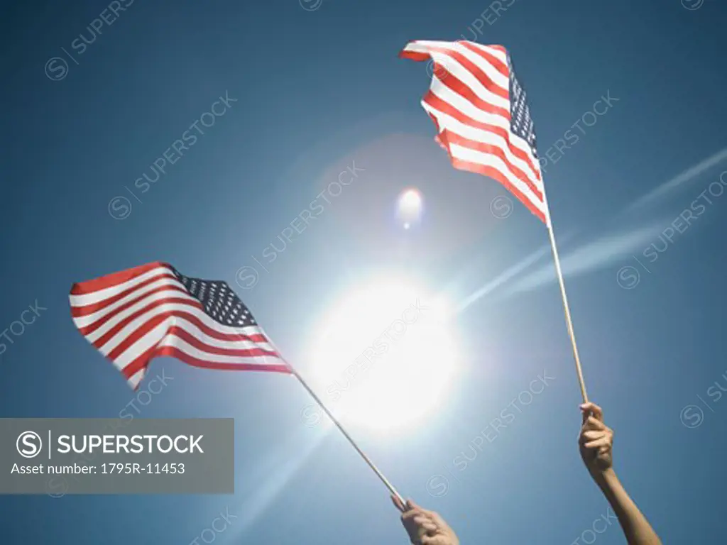 Woman holding American flags