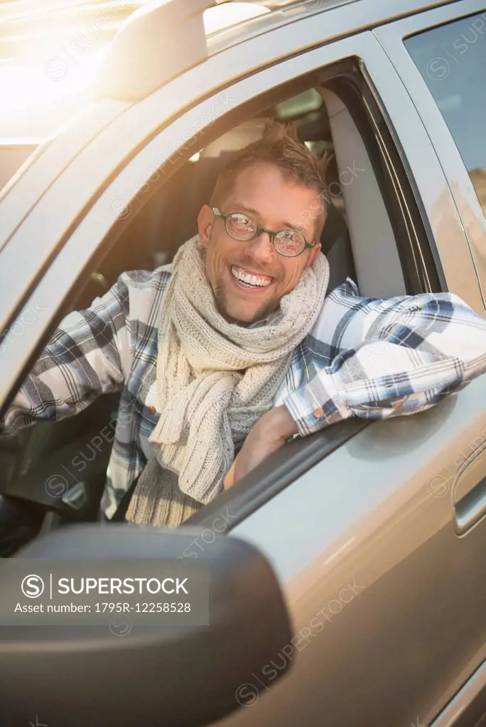 Portrait of smiling car owner