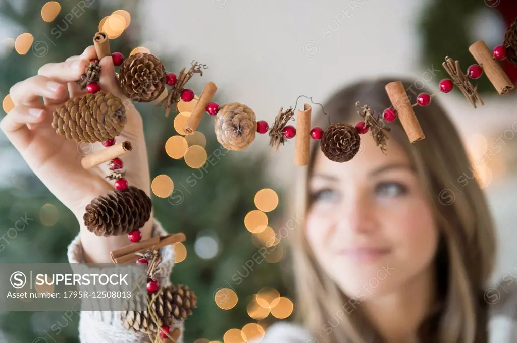 Woman preparing christmas decoration