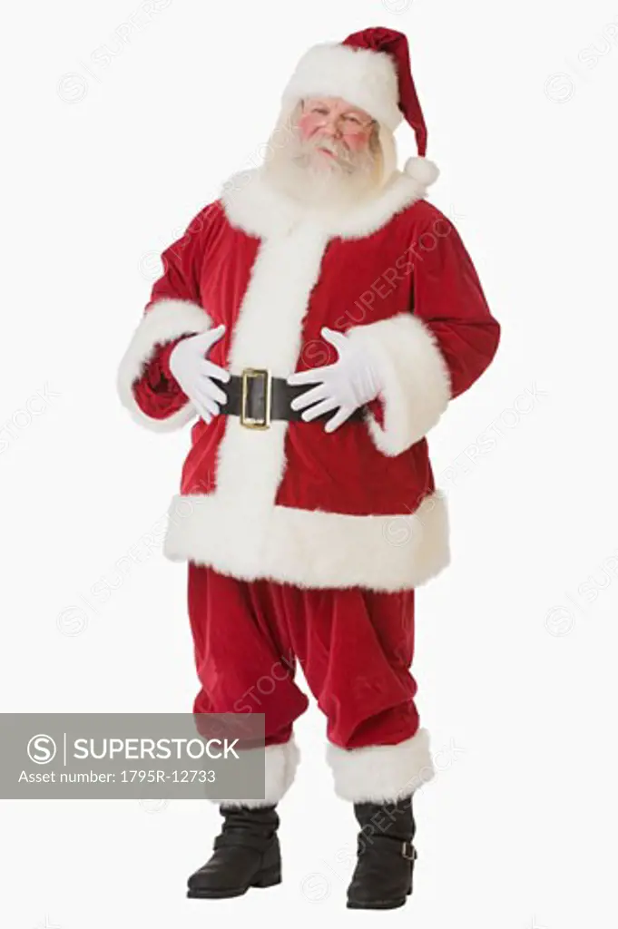 Santa Claus with hands on belly - SuperStock