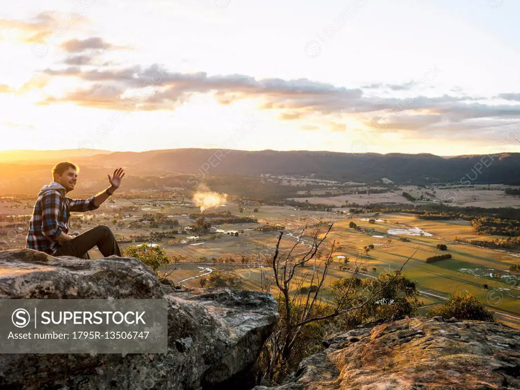 Australia, New South Wales, Man waving on Mount York