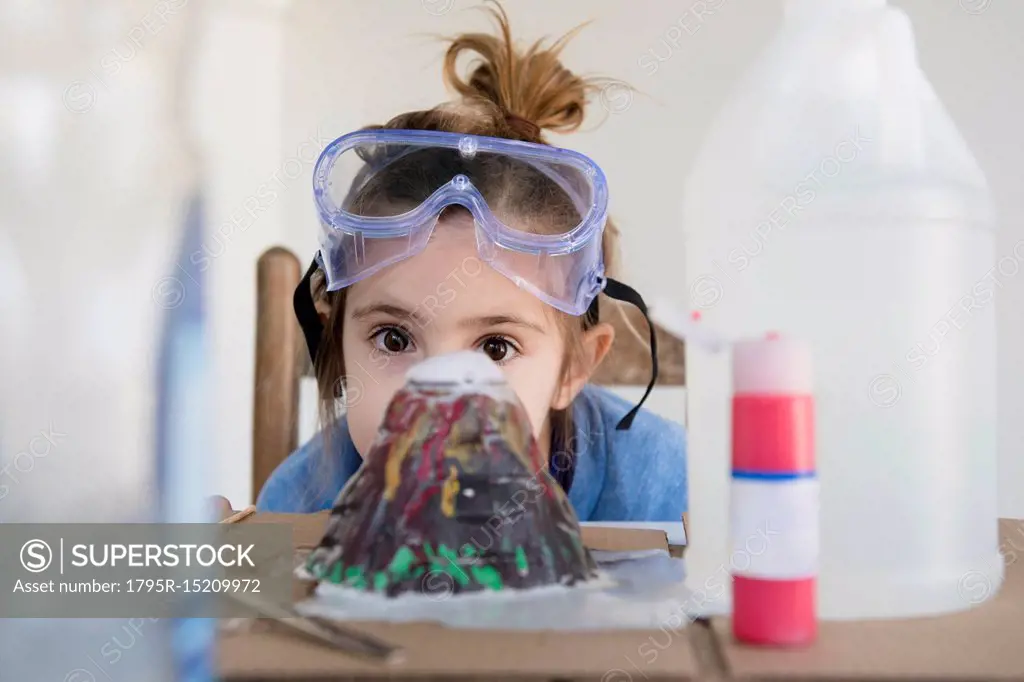 Girl making volcano