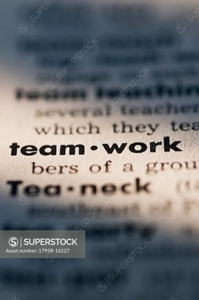 Close-up of teamwork definition