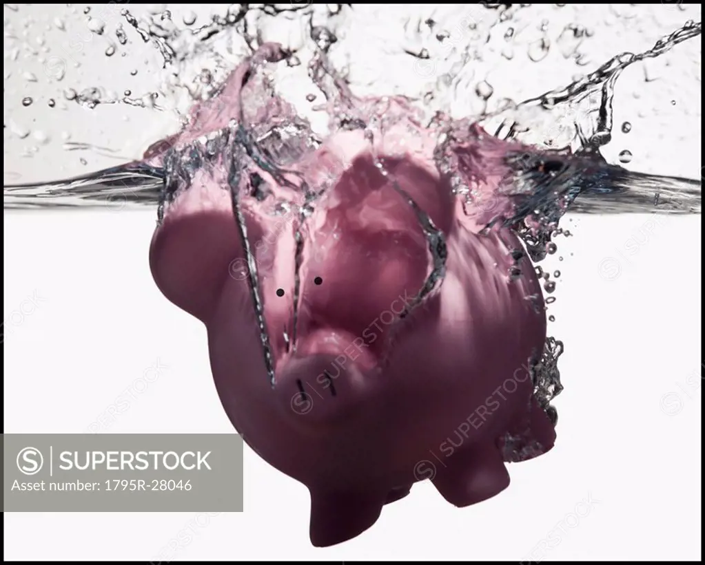 Piggy bank sinking in water