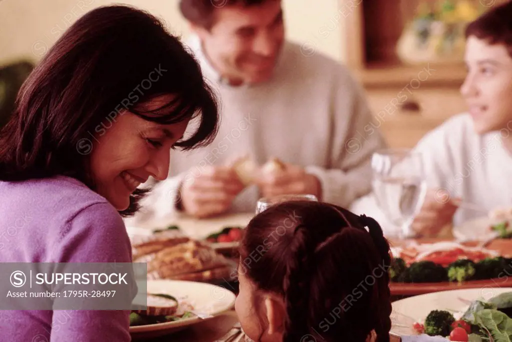 Family eating dinner at home