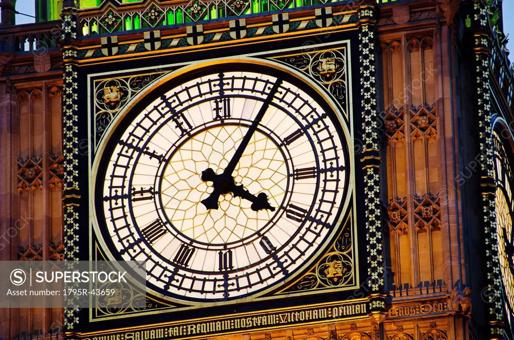 United Kingdom, London, Big Ben clock face illuminated at dusk