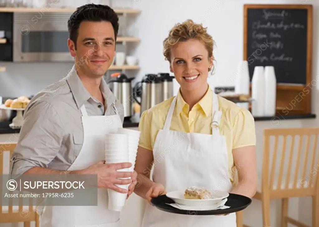 Portrait of wait staff in cafe