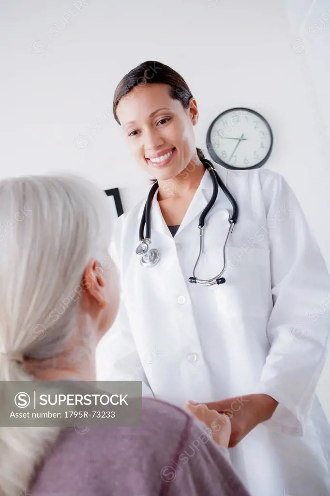 Doctor talking with senior patient