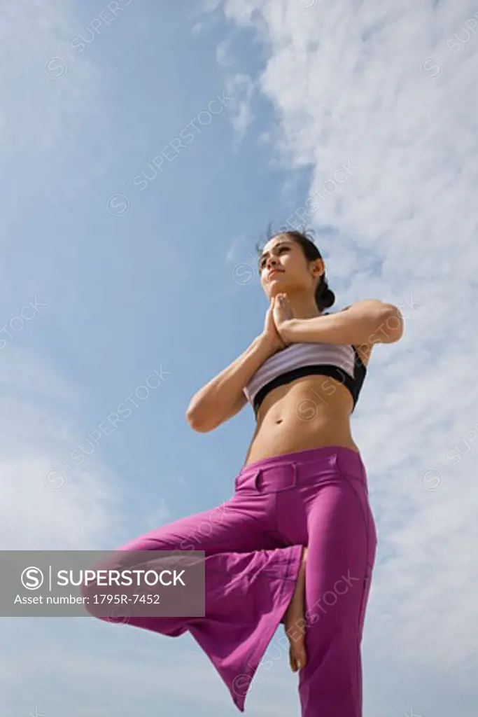 Woman practicing yoga