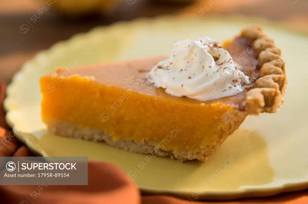 Slice of homemade pumping pie on plate