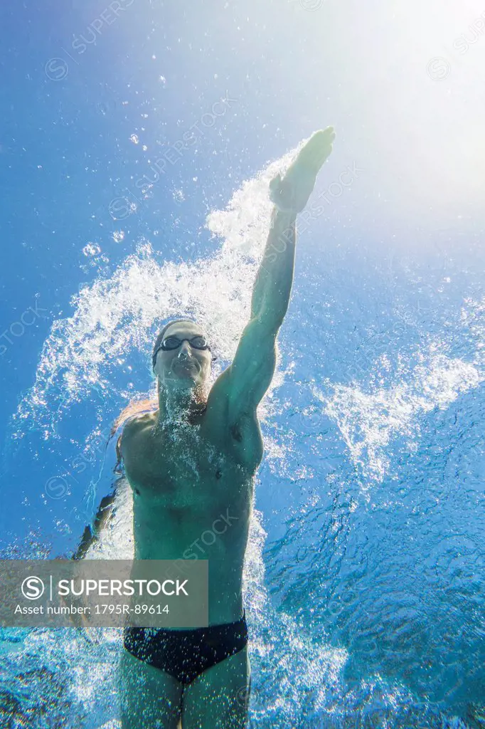 Underwater view of athletic swimmer