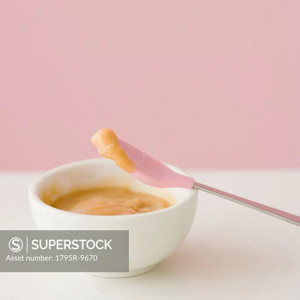 Close-up of baby food and spoon
