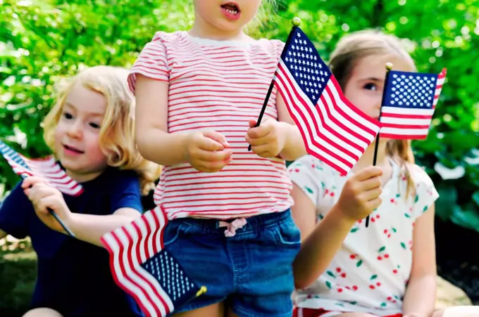 Children holding American flags