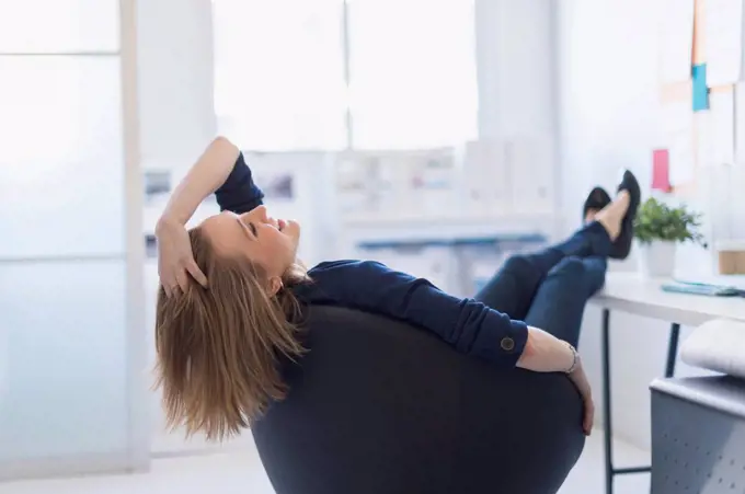 Business woman relaxing in office