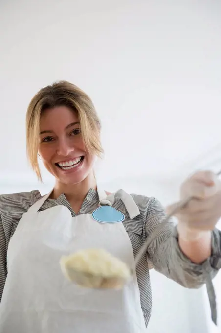 Portrait of charity volunteer holding food