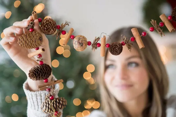 Woman preparing christmas decoration