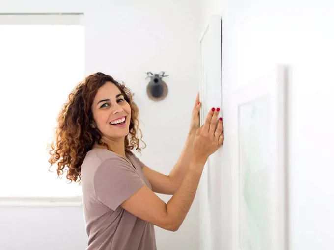 Woman decorating room