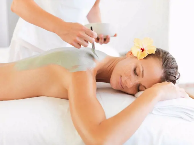 Woman receiving spa treatment