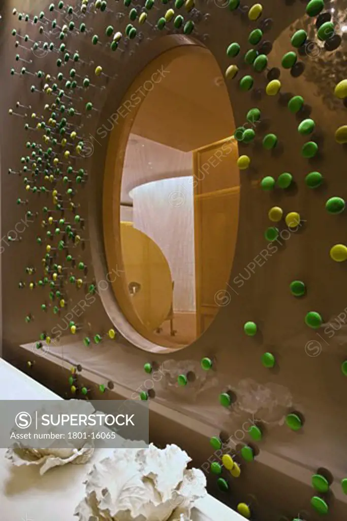 ALAIN DUCASSE RESTAURANT, DORCHESTER HOTEL, PARK LANE, LONDON, W1 OXFORD STREET, UNITED KINGDOM, PORT-HOLE WINDOW DETAIL IN SIDE ROOM WITH BUTTON WALL FEATURE, PATRICK JOUIN