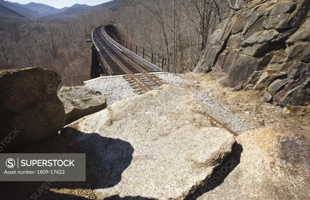 Crawford Notch State Park - Frankenstein Trestle  along the Maine Central Railroad in the White Mountains, New Hampshire USA. Chartered in 1867 as the Portland & Ogdensburg Railroad Company then leased to the Maine Central Railroad in 1888 and later aband