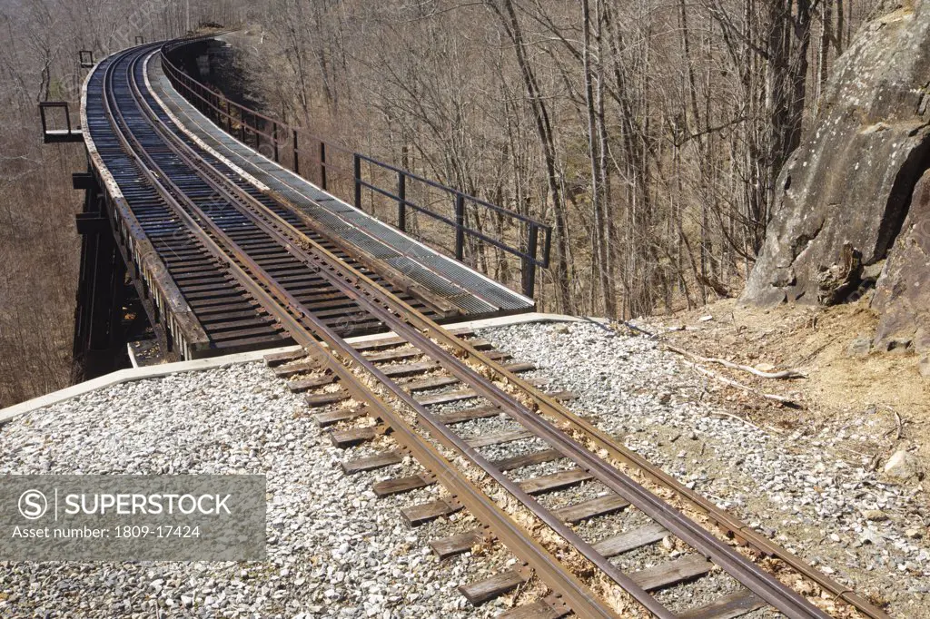 Crawford Notch State Park - Frankenstein Trestle  along the Maine Central Railroad in the White Mountains, New Hampshire USA. Chartered in 1867 as the Portland & Ogdensburg Railroad Company then leased to the Maine Central Railroad in 1888 and later aband